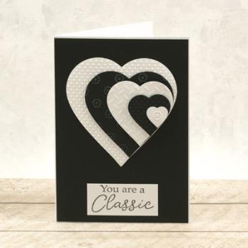 Couture Creations Cut, Foil & Emboss Die "Nesting Negative Hearts Dies"